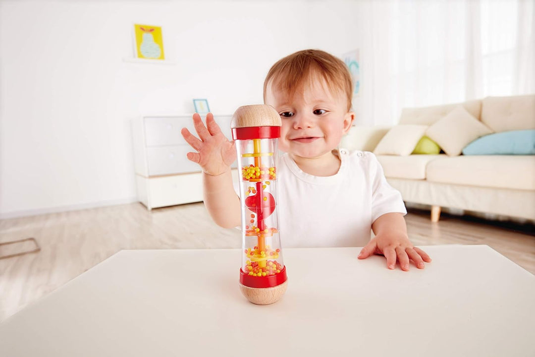 Hape E0331 - Stehauf-Pinguin, Stehaufmännchen mit Klang, blau, ab 6 Monaten & E0327 - Roter Regenmac