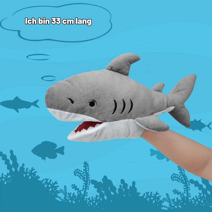 Das Leben ist eine Puppe, die mit einem bunten und beweglichen Mund gefüllt ist De-shark, De-shark