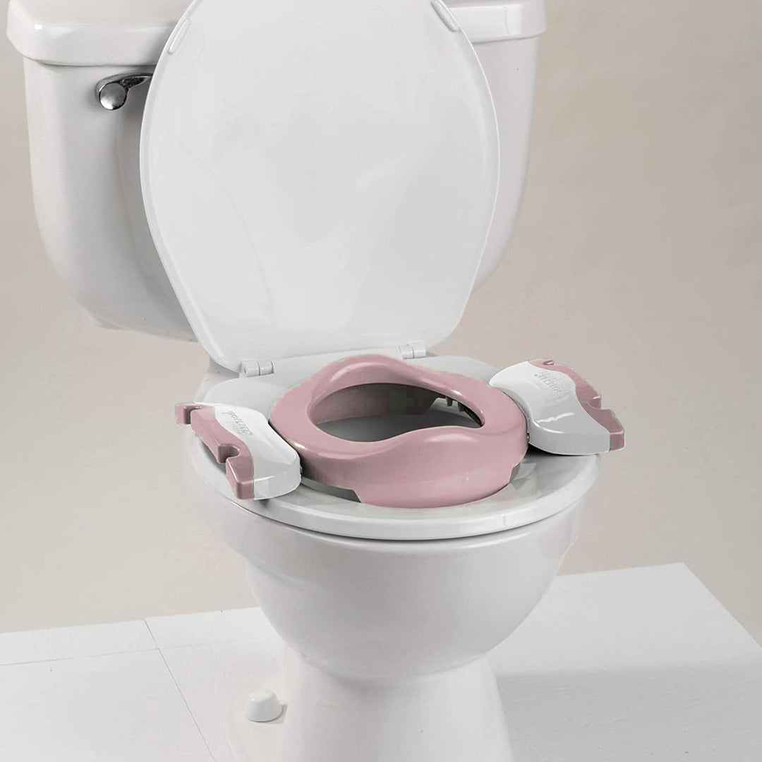 Potette Plus Reise-Töpfchen- und Toilettenreduzierer, Rosa, inklusive 3 Nachfüllungen