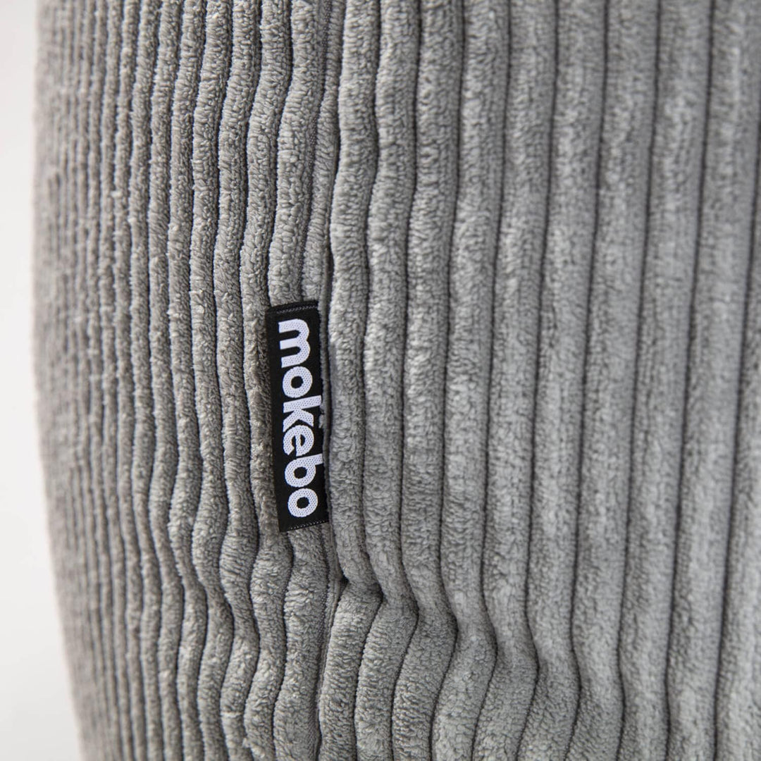 mokebo® Pouf, Hocker o. Sitzhocker aus Cord 40x60 cm 'Der Faule Lenz', Bodenkissen rund in Grau, Fus