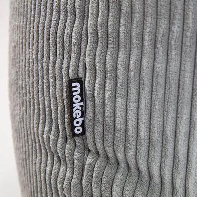 mokebo® Pouf, Hocker o. Sitzhocker aus Cord 40x60 cm 'Der Faule Lenz', Bodenkissen rund in Grau, Fus