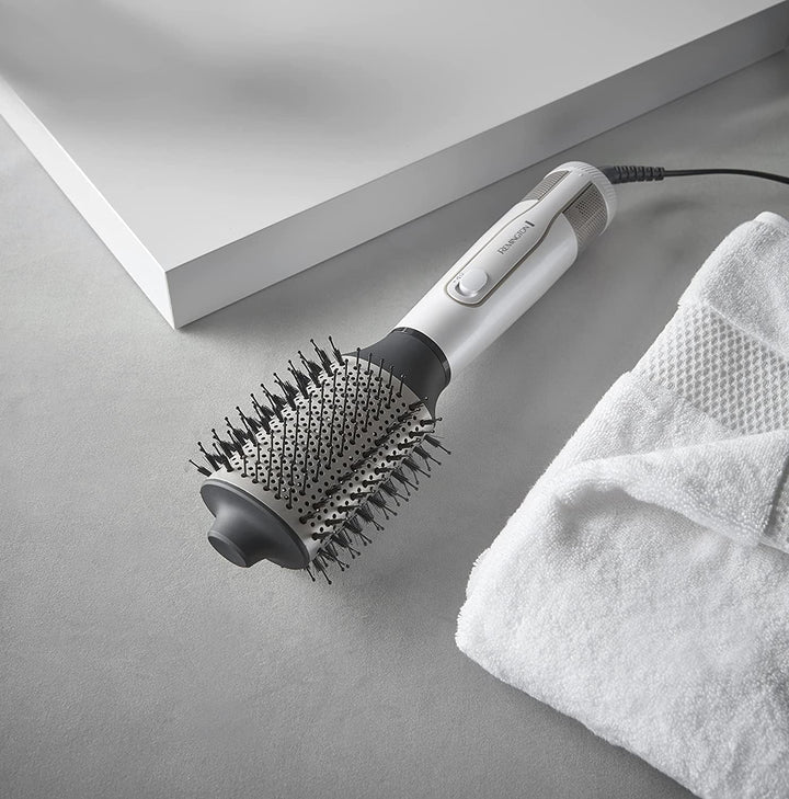 Remington Warmluftbürste Ionen Hydraluxe 2in1: Haartrockner & Volumenbürste (1200 Watt, Hydracare Te