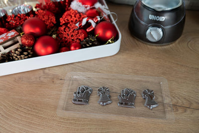 Unold 48967 Chocolatier Sparset Schokobrunnen Schokofondue Inkl. 12 Giessformen mit Weihnachtsmotive