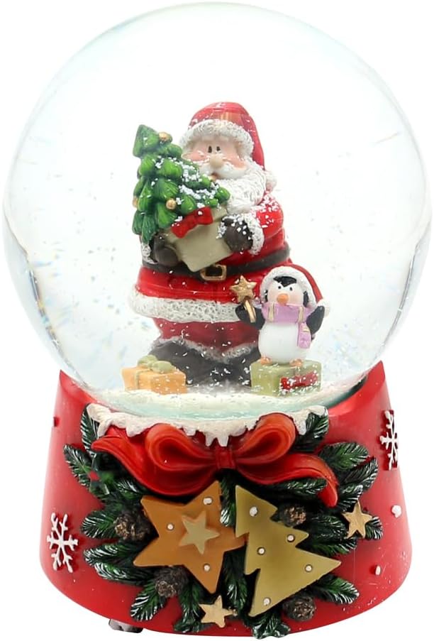 Schneekugel Santa mit Pinguin auf weihnachtlichen Sockel mit Spielwerk, Melodie Feliz Navidad, L/B/H
