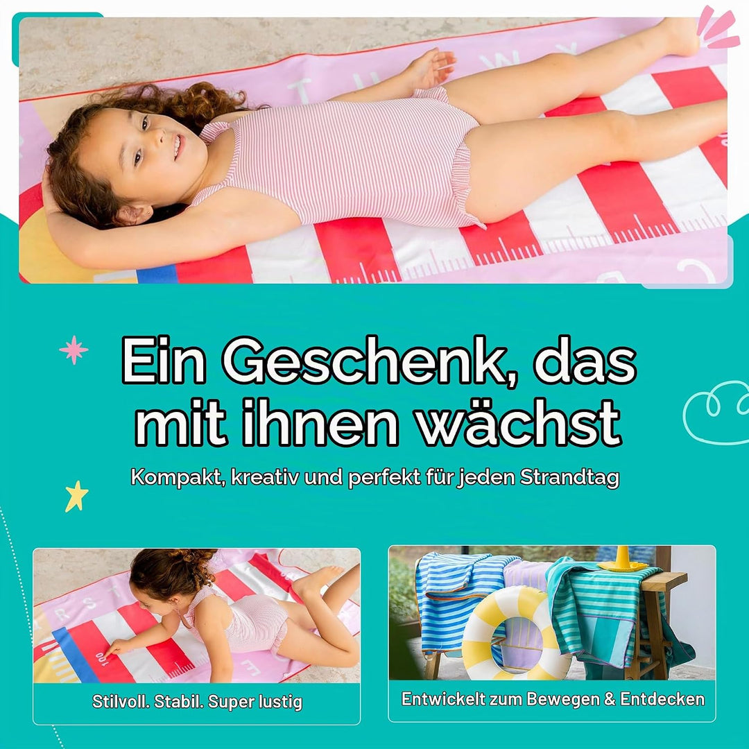 Quut – Strand-/Poolhandtuch für Kinder mit Spiel – Ultraschnell trocknende Mikrofaser, sandfrei – ko
