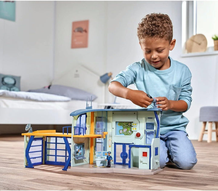 Simba 109251097 - Feuerwehrmann Sam Polizeistation, Spielfigur Rose, Garage für Polizeiauto, Sound u