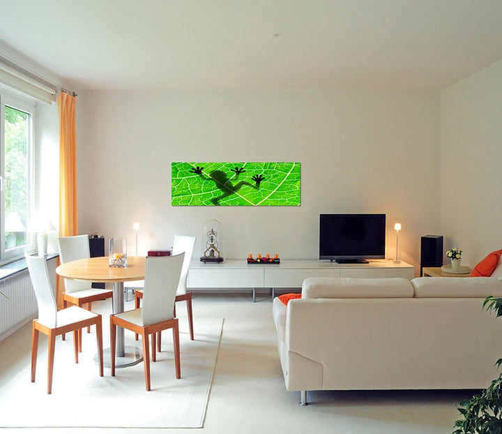 Paul Sinus Art Panoramabild auf Leinwand und Keilrahmen 150x50cm Blatt Frosch Silhouette Schatten