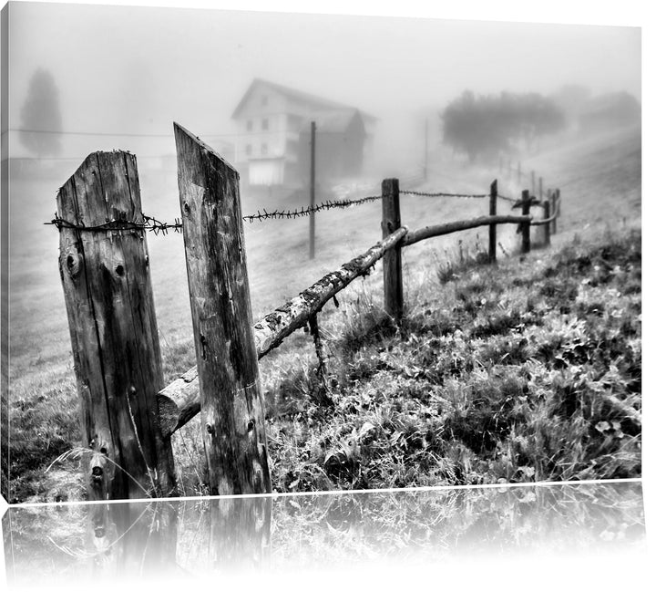 Pixxprint Monocrome, Rustikaler Holzzaun auf Wiese, Format: 100x70 auf Leinwand, 100x70