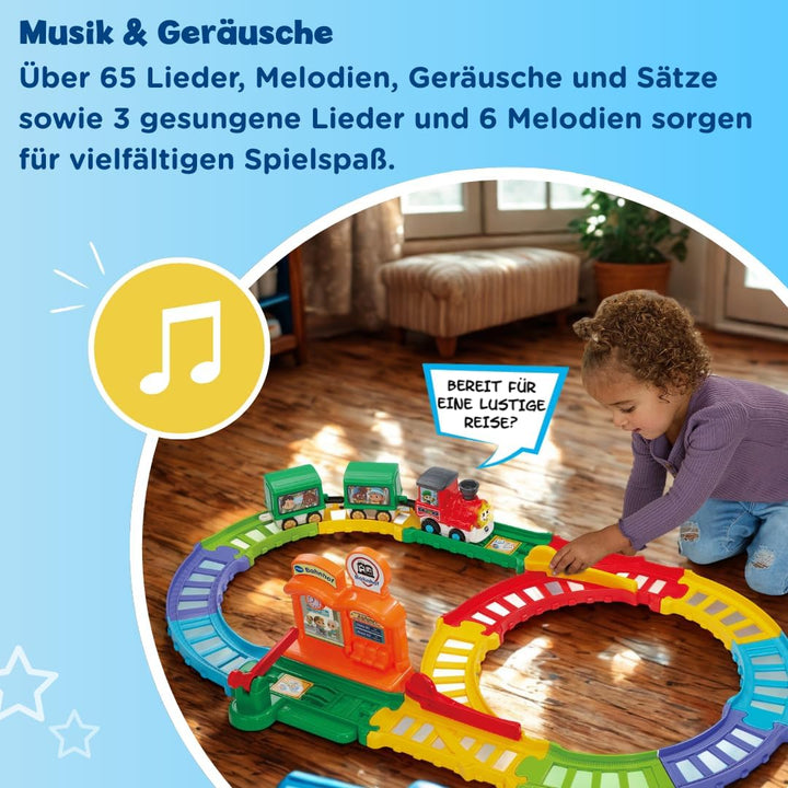 VTech TUT TUT Baby Flitzer Kleiner Bahnhof – Interaktives Spielset mit Zug, Schranke, Weichen & Magi