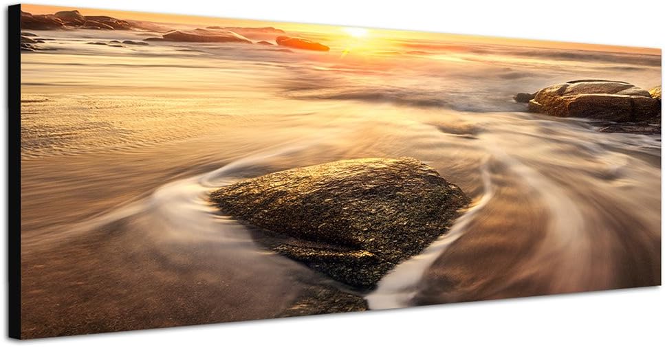 Paul Sinus Art Panoramabild auf Leinwand und Keilrahmen 150x50cm Meer Steine Felsen Dunst Sonnenaufg