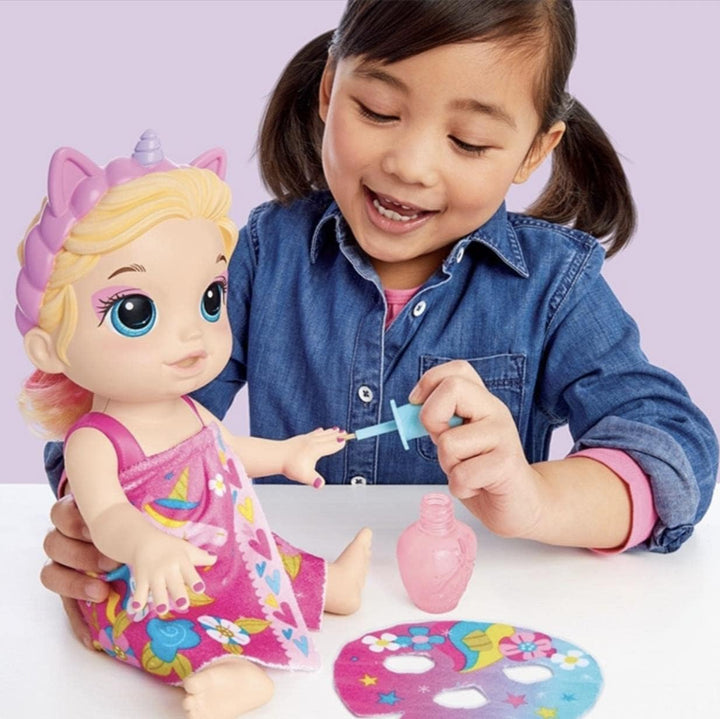 Baby Alive F3564 Baby Beauty Babypuppe, 32,5 cm, Einhorn-Motiv, magisches Make-up und Nägel, Blondes