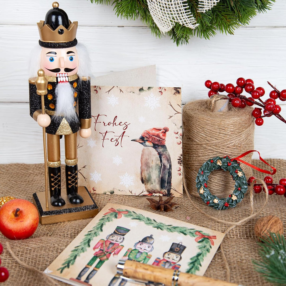 Logbuch-Verlag Nussknacker Figur schwarz Gold glitzernd aus Holz 26 cm Weihnachten König Dekofigur N