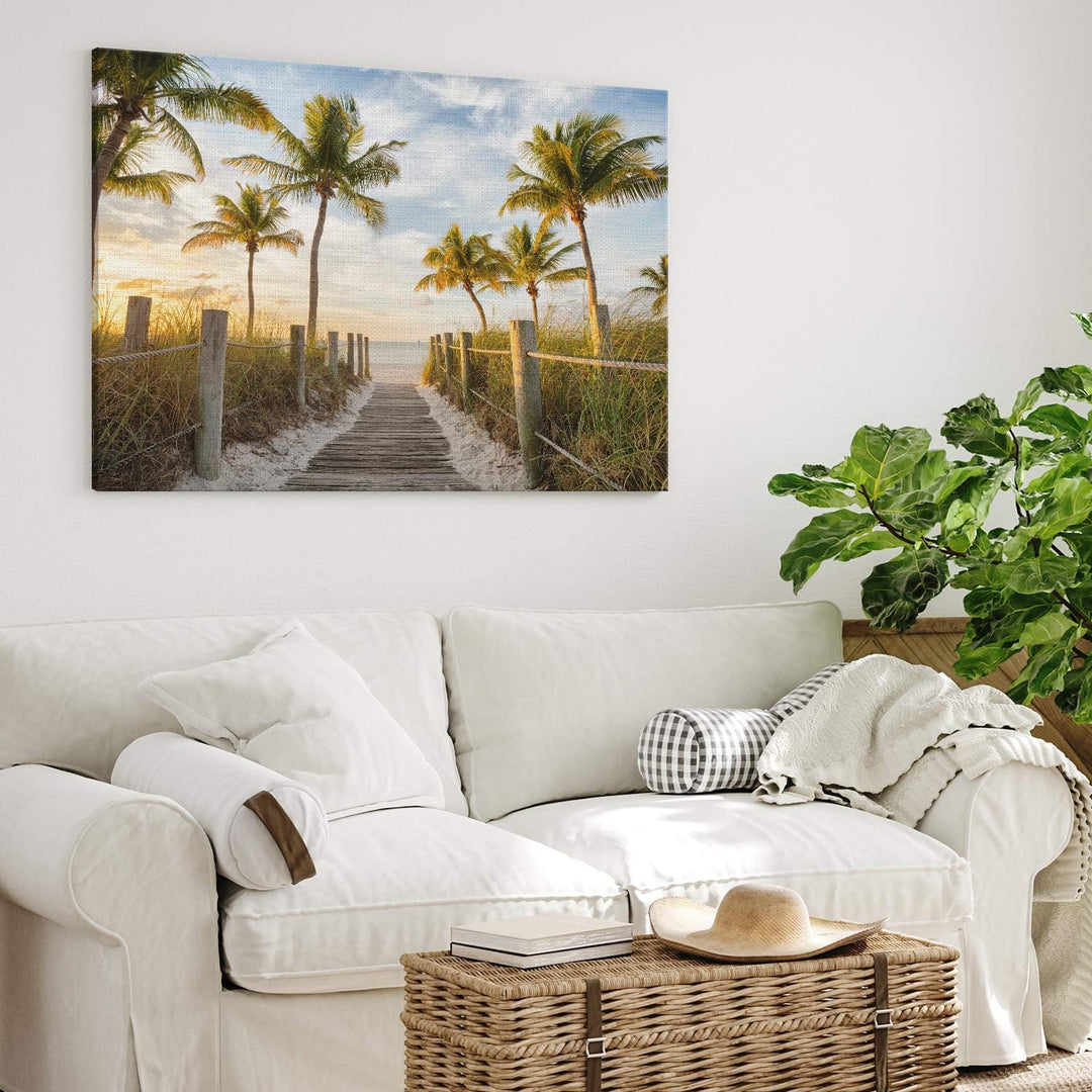 PICANOVA – Bild auf Leinwand Palmenweg zum Meer 100x75cm – Leinwandbild – Premium Leinwanddruck – Wa