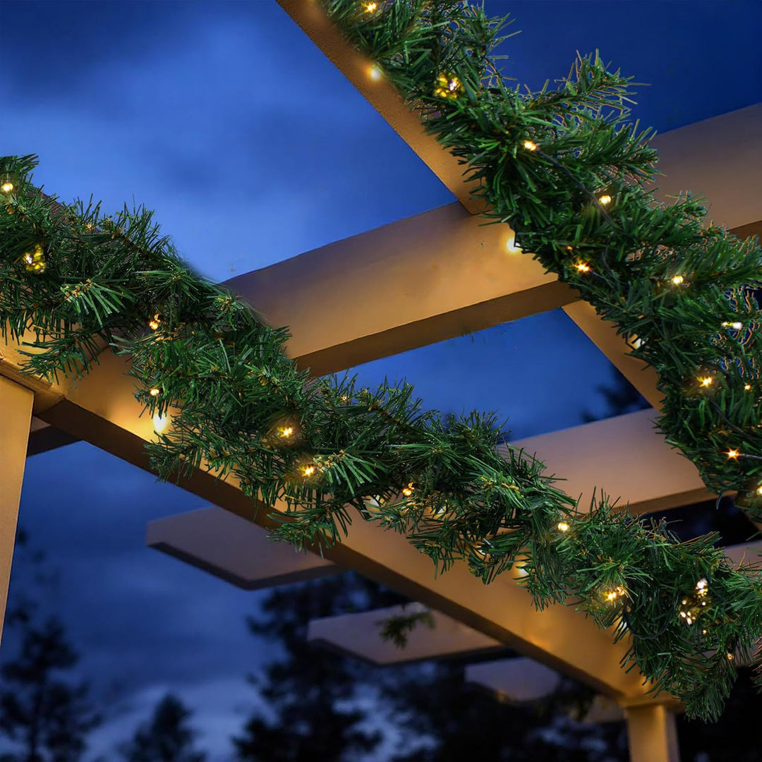 Spetebo Weihnachtsgirlande grün mit 70 LED Lichterkette warmweiss für Aussen - 540 cm - Kunst Tannen