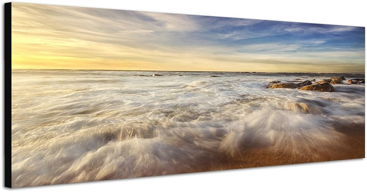 Paul Sinus Art Panoramabild auf Leinwand und Keilrahmen 150x50cm Meer Wellen Steine Wolkenschleier