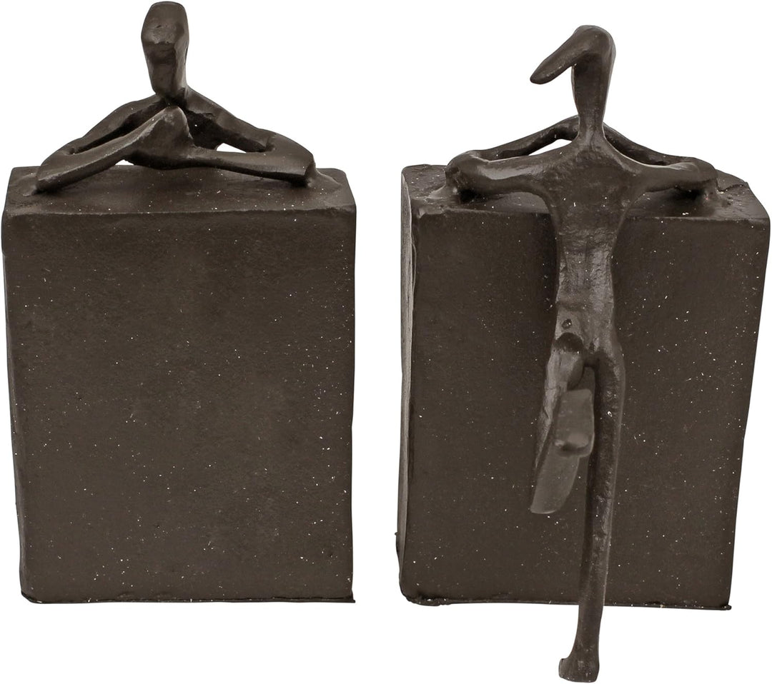 Design Toscano Über dem Buchregal, Figuren aus Eisenguss