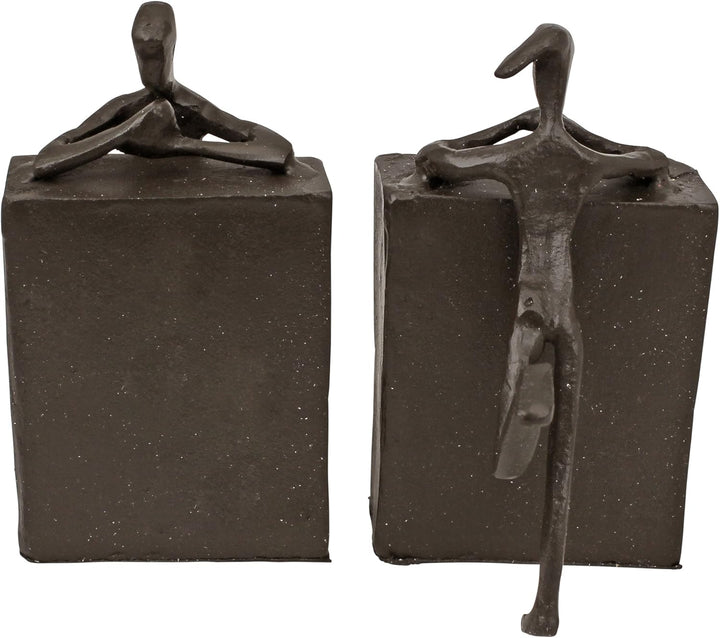 Design Toscano Über dem Buchregal, Figuren aus Eisenguss