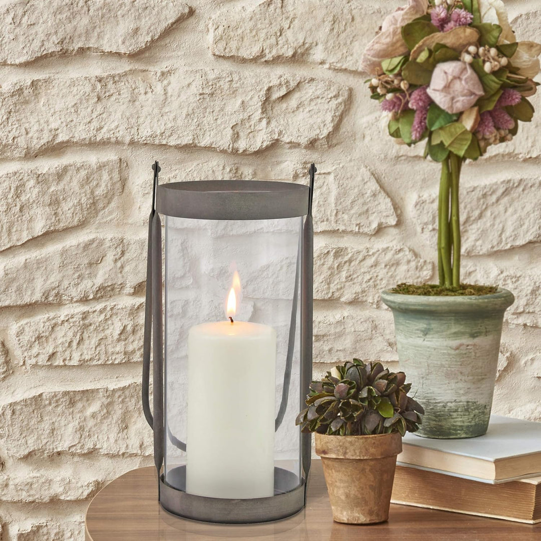 Stonebriar Industrial Glass Cylinder Hurricane Candle Lantern with Rustic Zinc Metal Frame and Handl