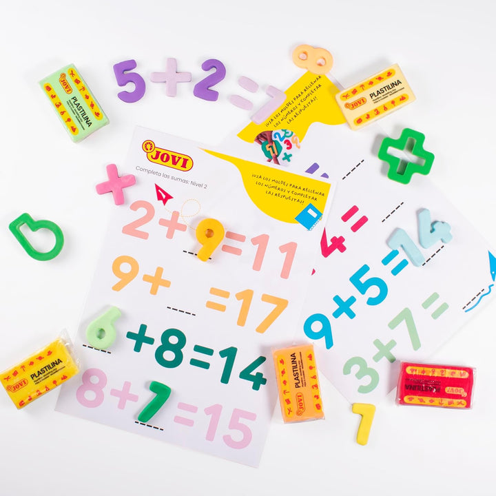 Jovi Truhe mit Buchstaben, Zahlen und geometrischen Formen, mehrfarbig, 96 Stück