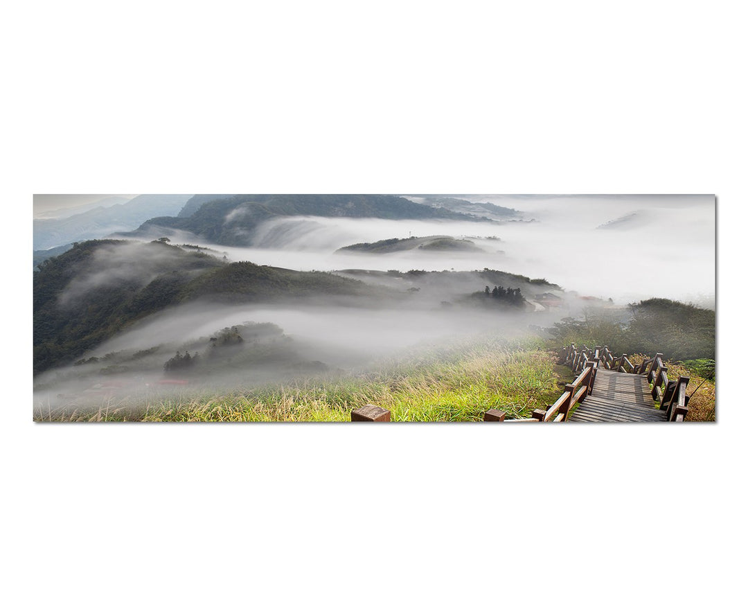 Paul Sinus Art Panoramabild auf Leinwand und Keilrahmen 150x50cm Berge Wiese Holztreppe Nebel Sonne