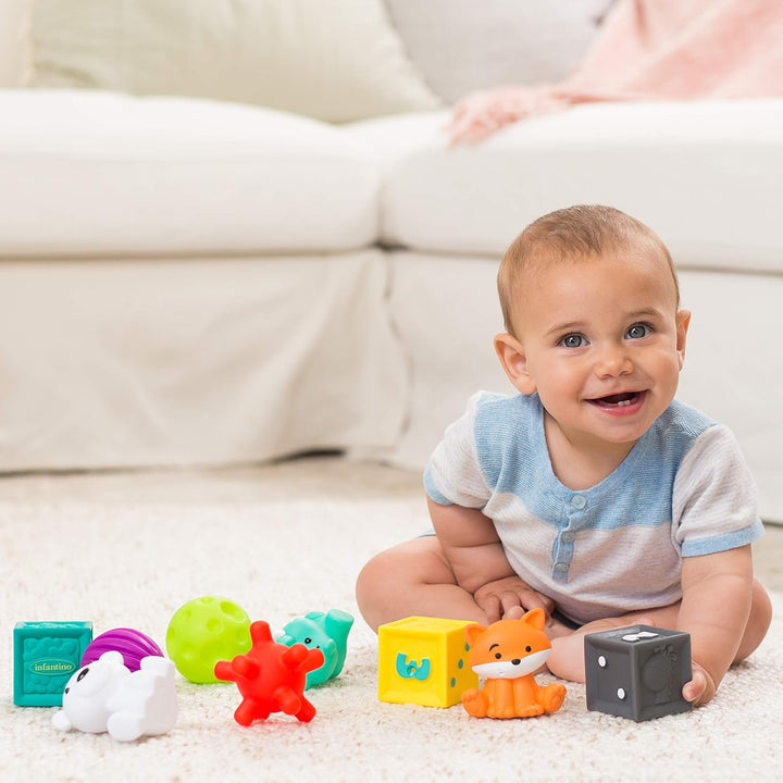INFANTINO 216289 Sensory Plug und Roll Multiblöcke Kübel mit Texturierter Spielzeuge, Kübel mit