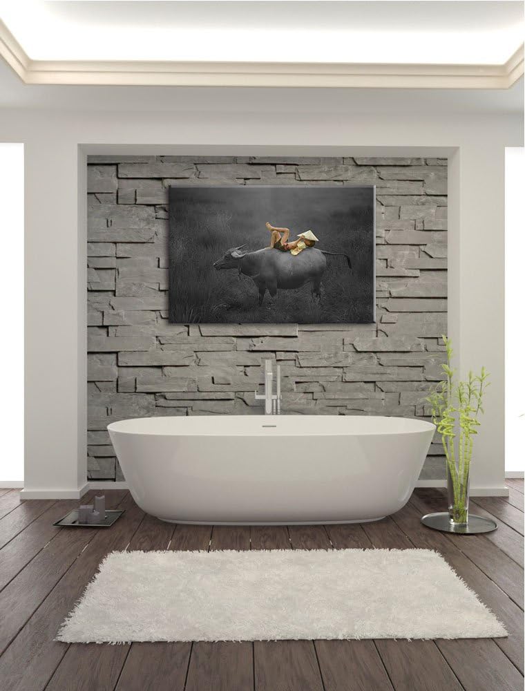 liegendes Kind auf Wasserbüffel schwarz/weiss Format: 100x70 auf Leinwand, XXL riesige Bilder fertig