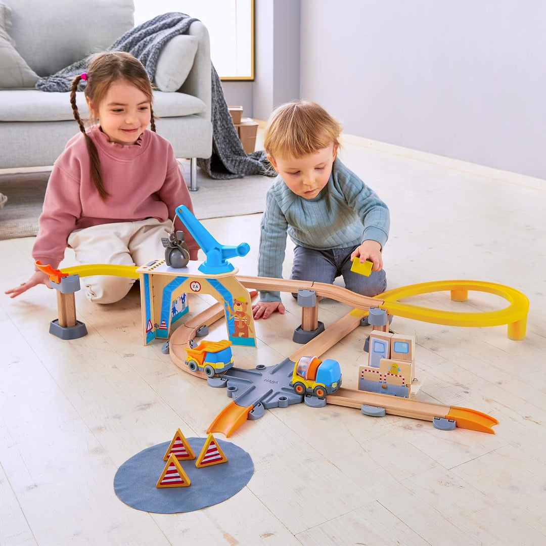 HABA Kullerbü Spielbahn Grosse Baustelle - Bunte Holz-Kugelbahn mit Fahrzeugen - Erweiterbares Klick