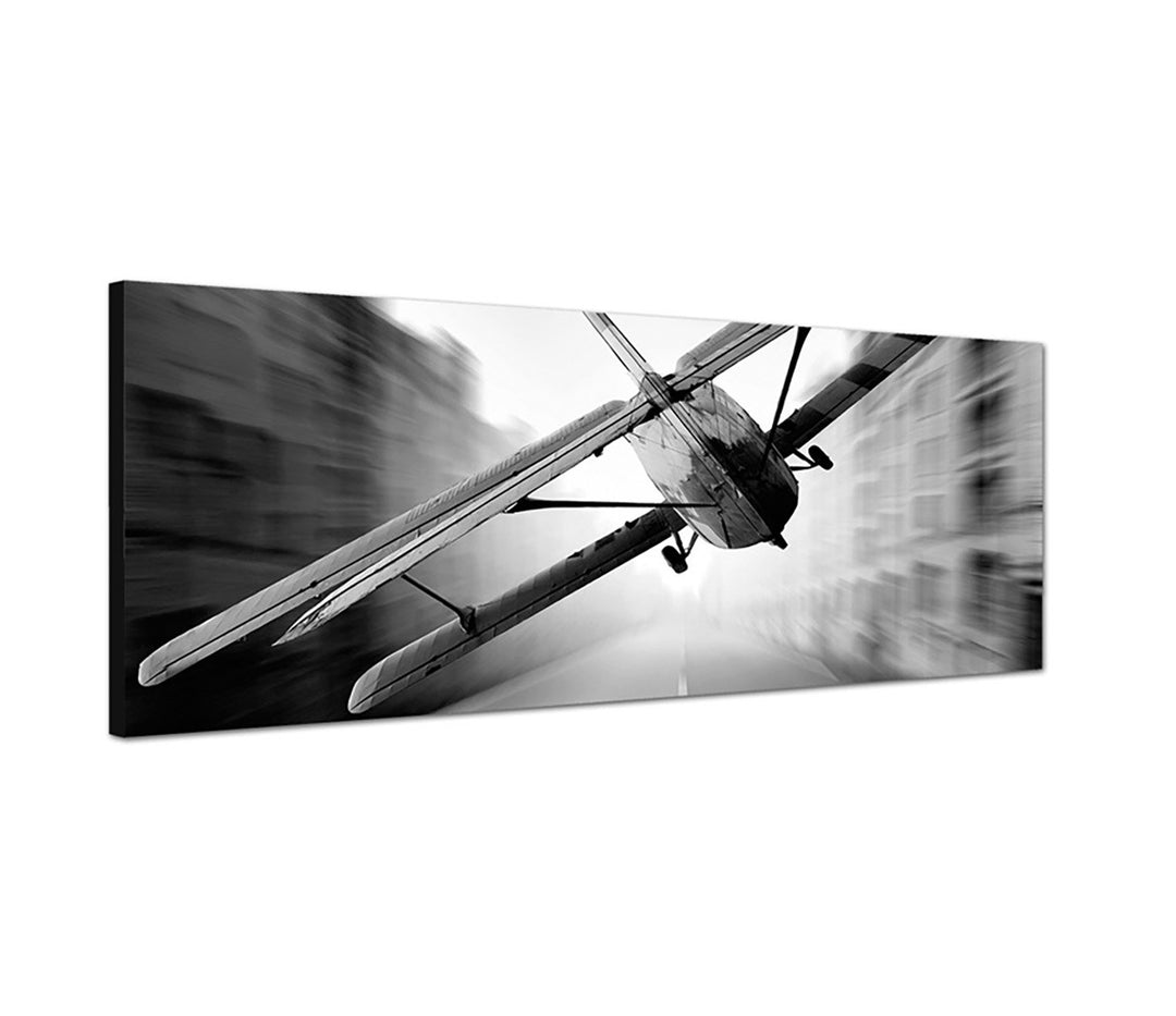 Augenblicke Wandbilder Leinwandbild als Panorama in 150x50cm Strasse Stadt Segelflieger schwarz/weis