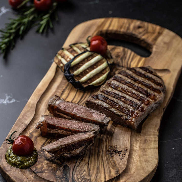 SOLTAKO Olivenholz Schneidebrett, Holzbrett, Servierbrett, Frühstücksbrett, Steakbrett, Brett mit He