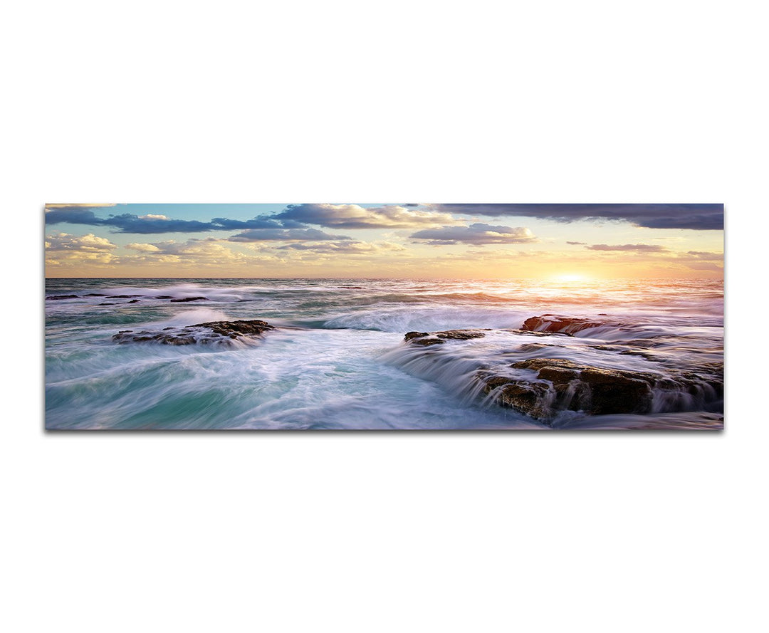 Paul Sinus Art Panoramabild auf Leinwand und Keilrahmen 150x50cm Meer Felsen Wellen Sonnenstrahlen