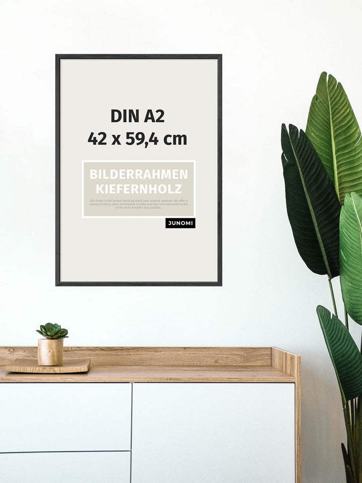JUNOMI® Bilderrahmen DIN A2 (42x59,4 cm) Holz | Farbe Schwarz | Posterrahmen mit bruchsicherem Acryl