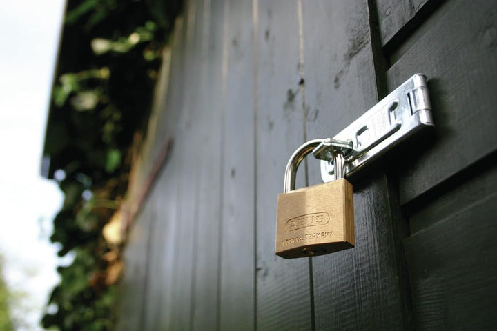 ABUS Vorhängeschloss Messing 85/50HB80 - mit hohem Bügel - für Kellertüren, Schuppen u. v. m. - wett