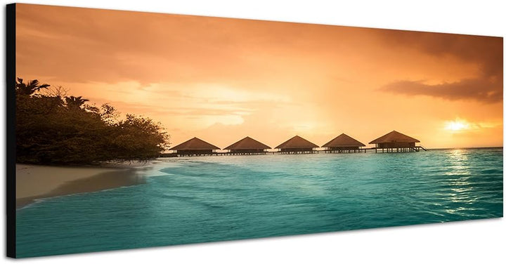 Paul Sinus Art Panoramabild auf Leinwand und Keilrahmen 150x50cm Meer Strand Steg Bungalows Abendson