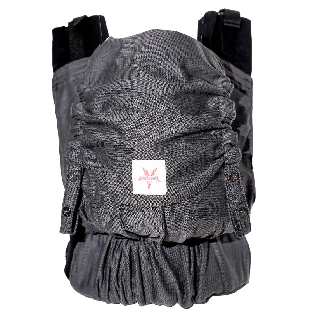 KOKADI Babytrage Flip - ergonomisch, mitwachsend und einfach - sichere Tragehilfe ab Geburt bis 15kg