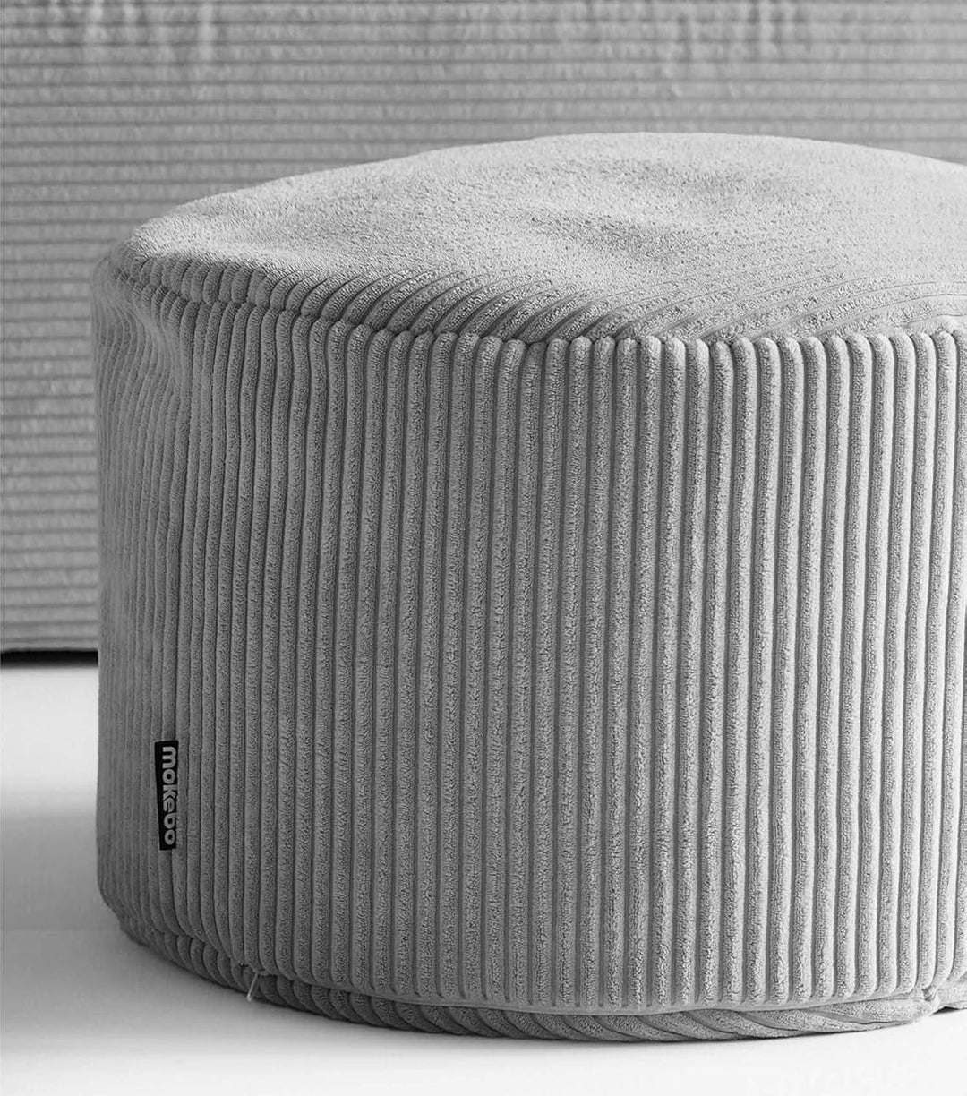 mokebo® Pouf, Hocker o. Sitzhocker aus Cord 40x60 cm 'Der Faule Lenz', Bodenkissen rund in Grau, Fus