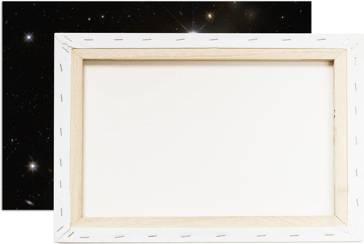 deyoli Dark weite Galaxien mit leuchtenden Sternen im Format: 80x60 als Leinwandbild, Motiv fertig g
