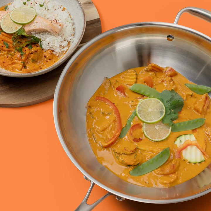 Reishunger Unbeschichteter Edelstahl Wok – 30 cm Durchmesser – mit ofenfestem Deckel – Für alle Herd