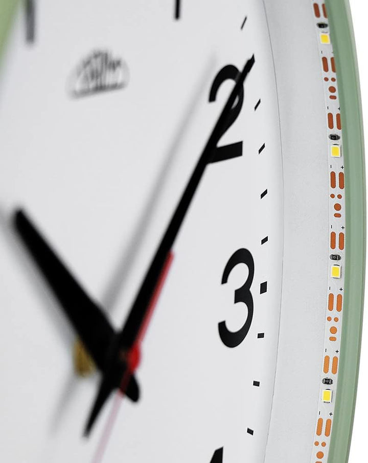 PRIM Insight Leuchtende Design Kunstoff Wanduhr, Weiss/Grün, Licht- und Geräusch-Sensor, Quarz-Uhrwe