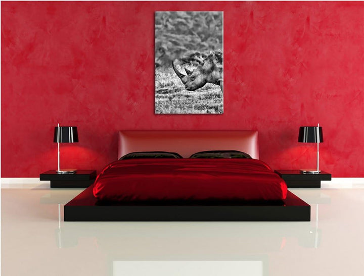 Pixxprint grosses Nashorn in der Savanne / 100x70cm Leinwandbild bespannt auf Holzrahmen/Wandbild Ku