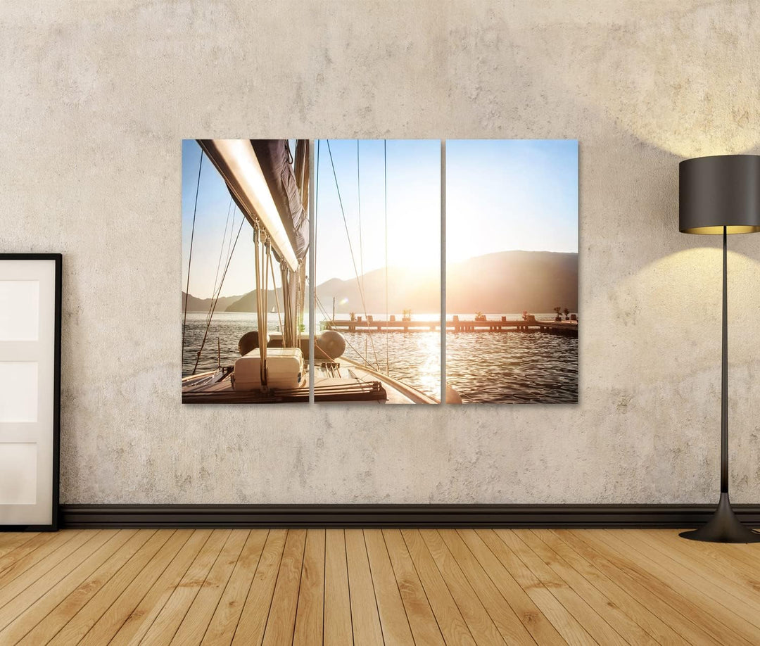 islandburner Bild auf Leinwand Segelboot Auf Dem Meer Mit Steg Bei Sonnenuntergang Bilder Wandbilder