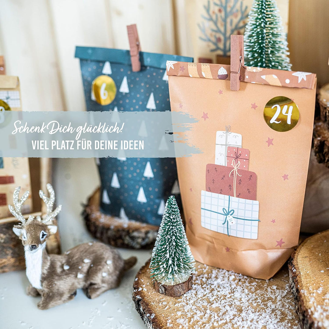 Papierdrachen Adventskalender 2025 zum Befüllen - 24 braune & petrolfarbene bedruckte Geschenktüten
