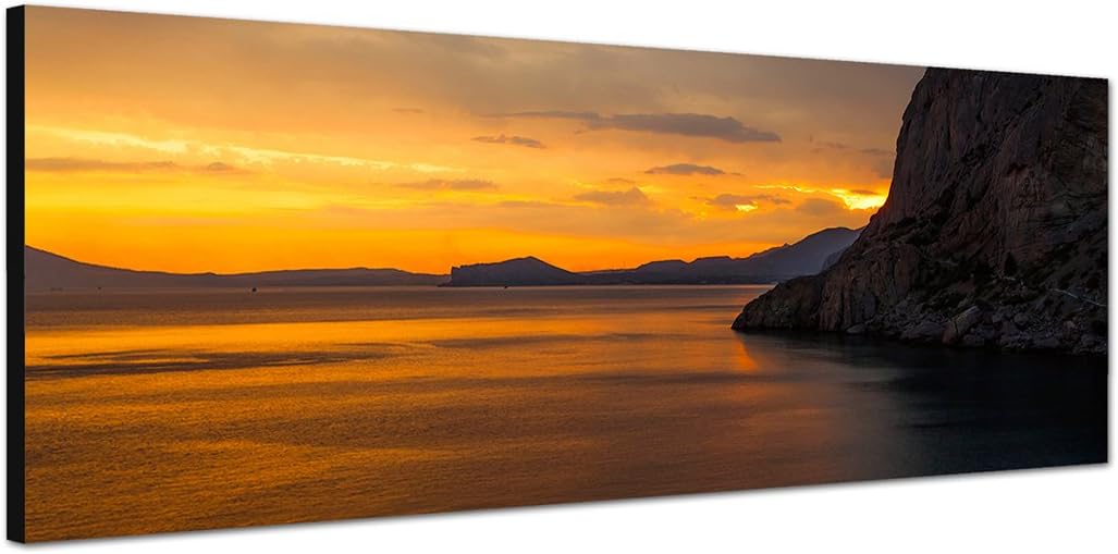 Paul Sinus Art Panoramabild auf Leinwand und Keilrahmen 150x50cm Meer Felsen Küste Sonnenuntergang