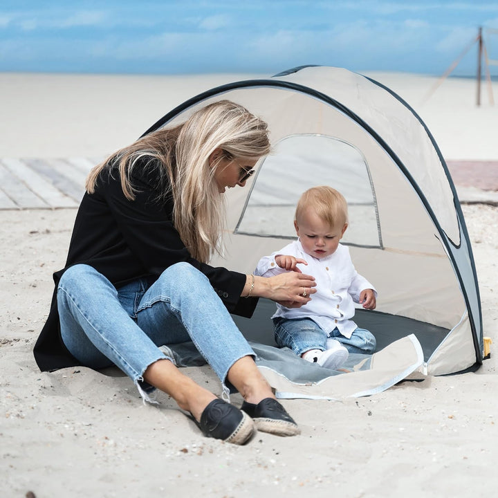 Deryan Strandzelt Pop Up - Leichtgewicht - 50% UV-Schutz - Inklusive Pflöcke und Tragetasche - Creme