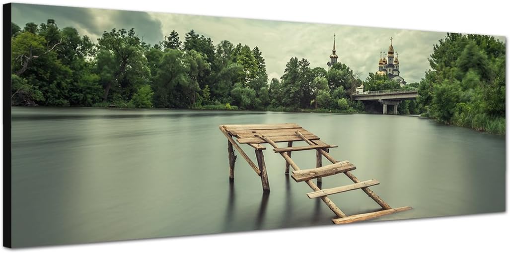 Paul Sinus Art Panoramabild auf Leinwand und Keilrahmen 150x50cm See Holzsteg Bäume Kirche Himmel