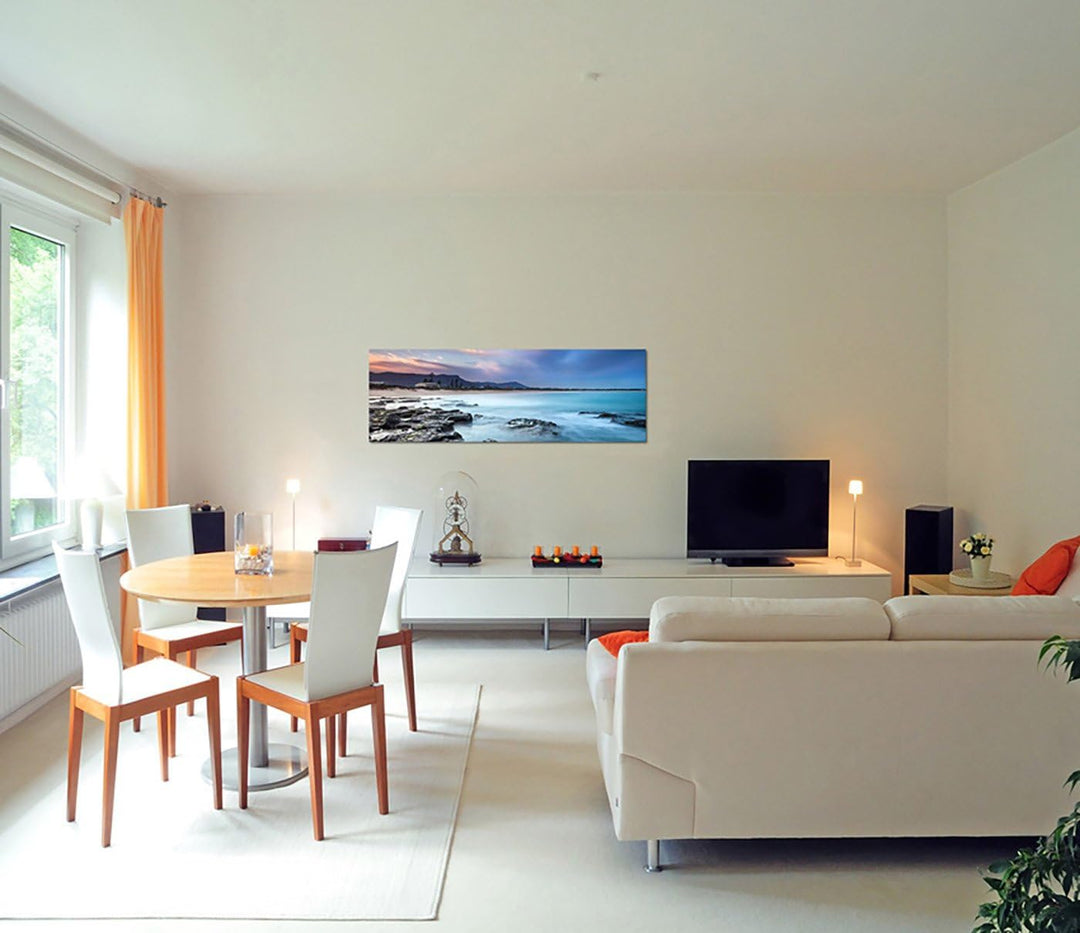 Paul Sinus Art Panoramabild auf Leinwand und Keilrahmen 150x50cm Strand Felsen Morgendämmerung Nebel