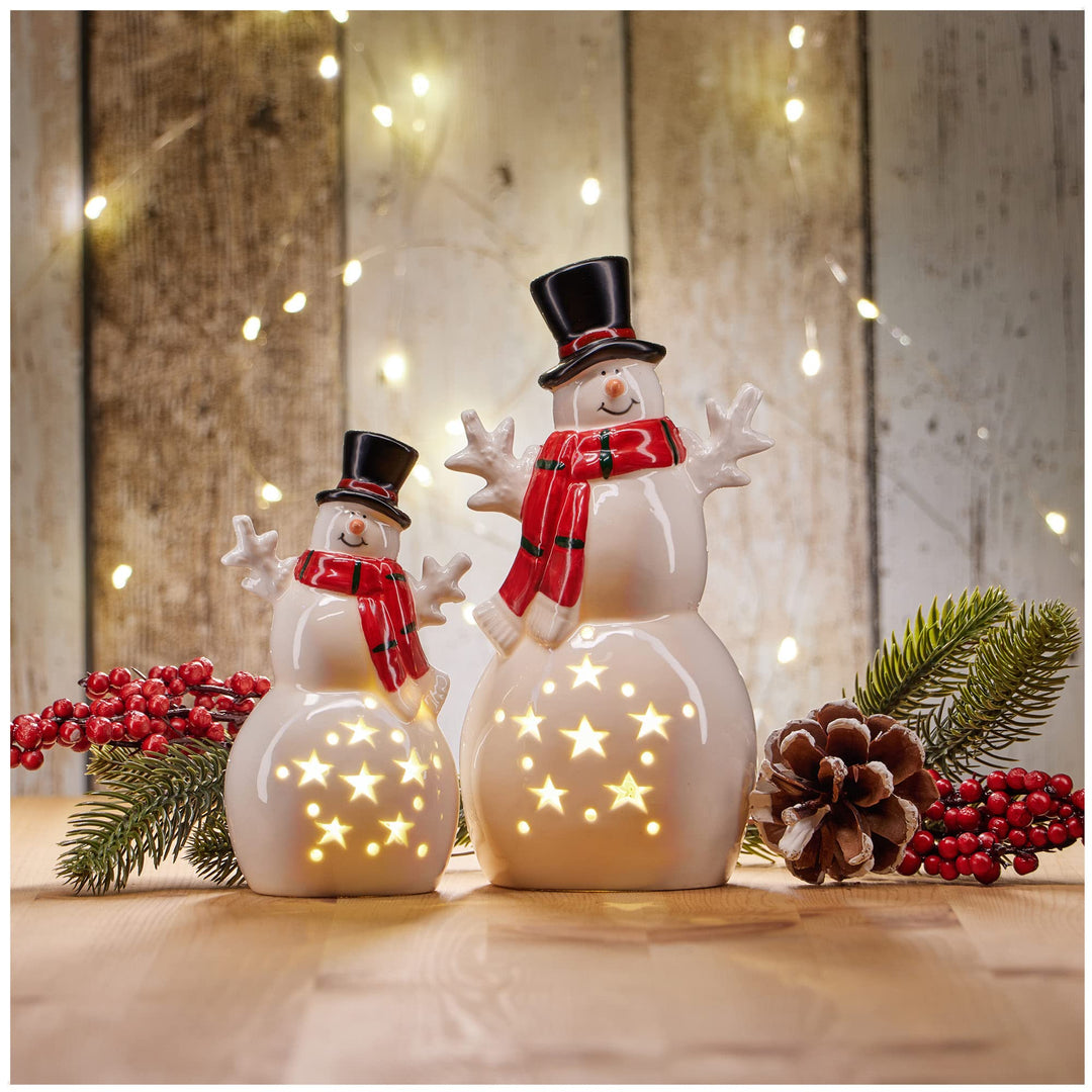 COM-FOUR® 2X LED Schneemann als dekorative Beleuchtung - Lichterstatue - Weihnachtsfigur aus Keramik