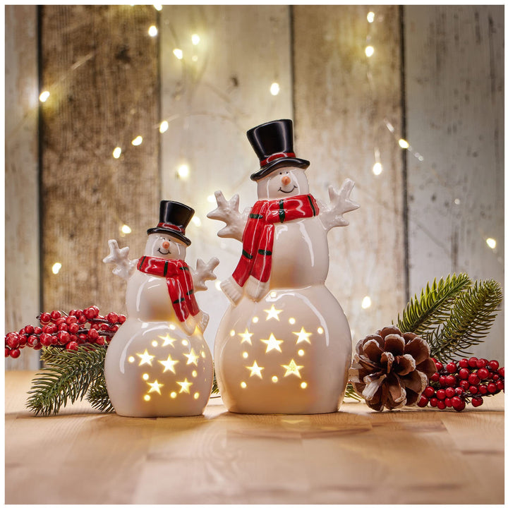 COM-FOUR® 2X LED Schneemann als dekorative Beleuchtung - Lichterstatue - Weihnachtsfigur aus Keramik