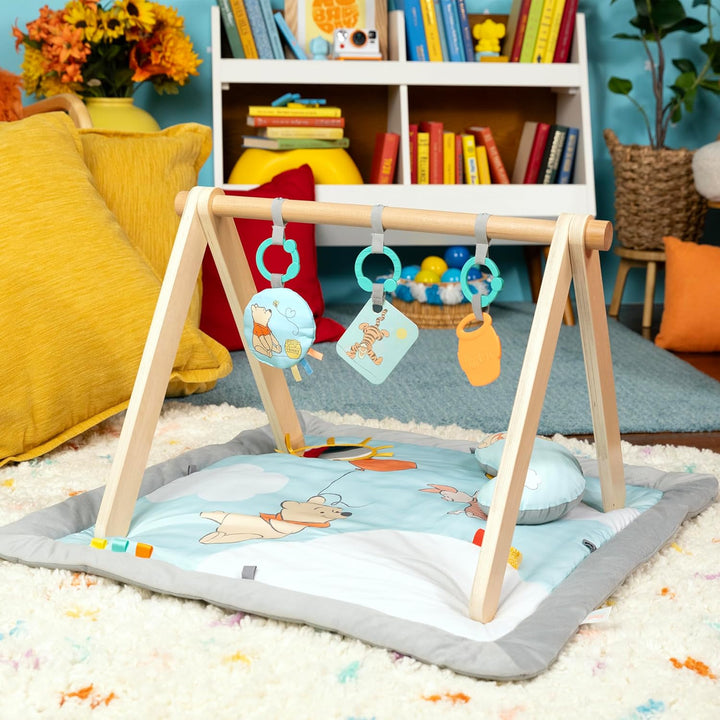 Bright Starts Disney Winnie PUUH Once Upon a Tummy Time Baby Aktivitätenmatte mit Spielzeugstange au