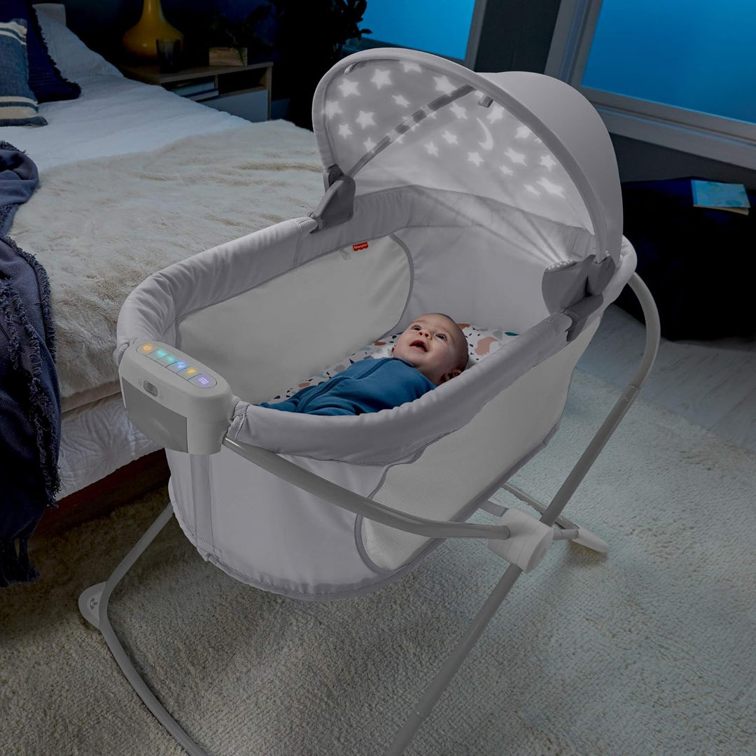 Fisher-Price GWD36 - Zusammenklappbares Beistellbettchen – tragbares Babybettchen mit Licht für Neug
