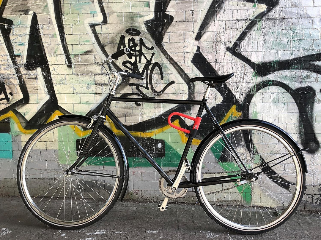 U-Schloss mit Sicherheitskabel und Halterung für Fahrrad und E-Scooter hellrot sicher gummiert